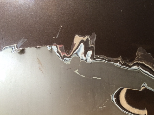 A rear wing on which all the layers of paint are noticable